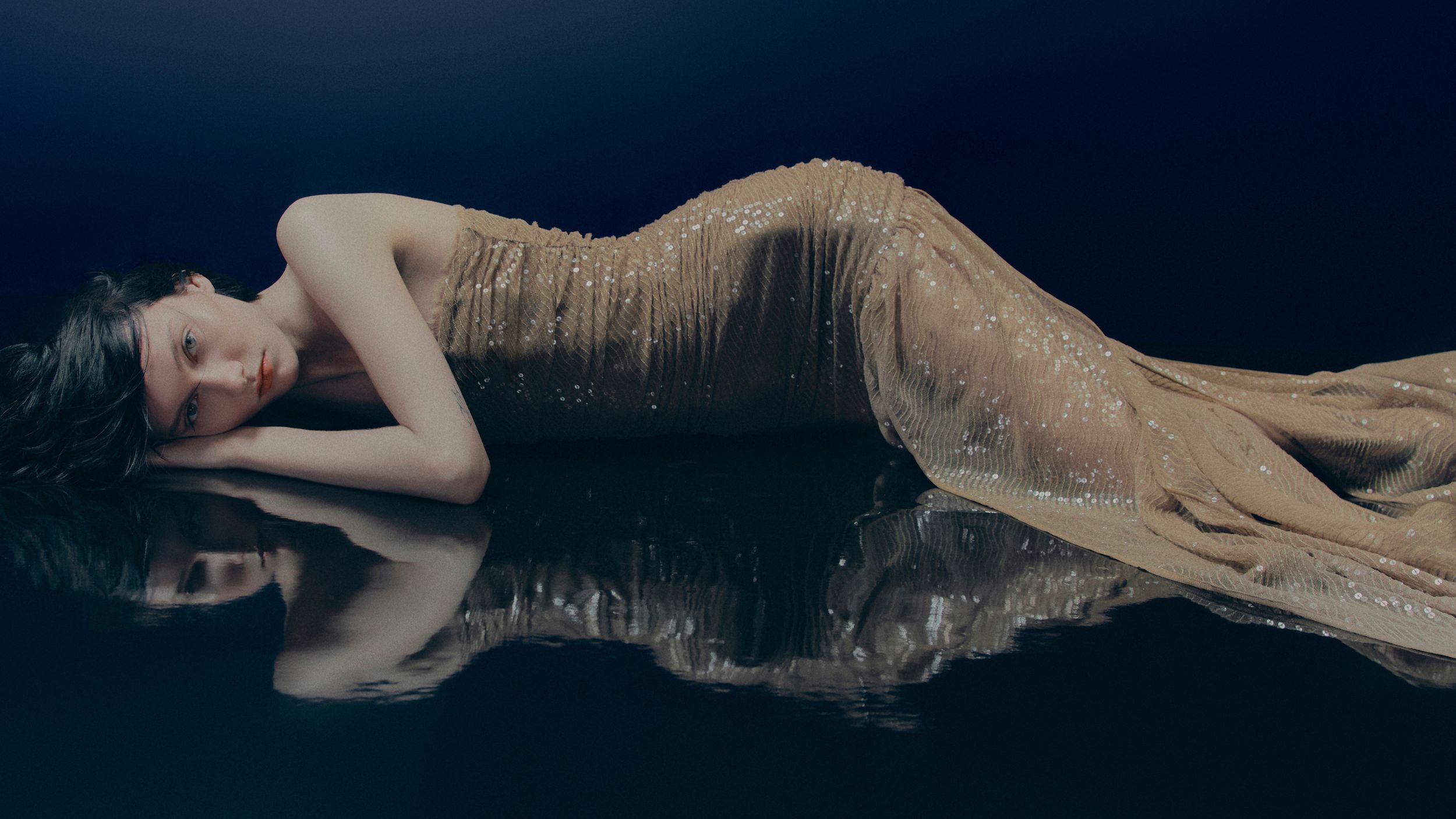 models wearing clothes from the new H&amp;M studio collection