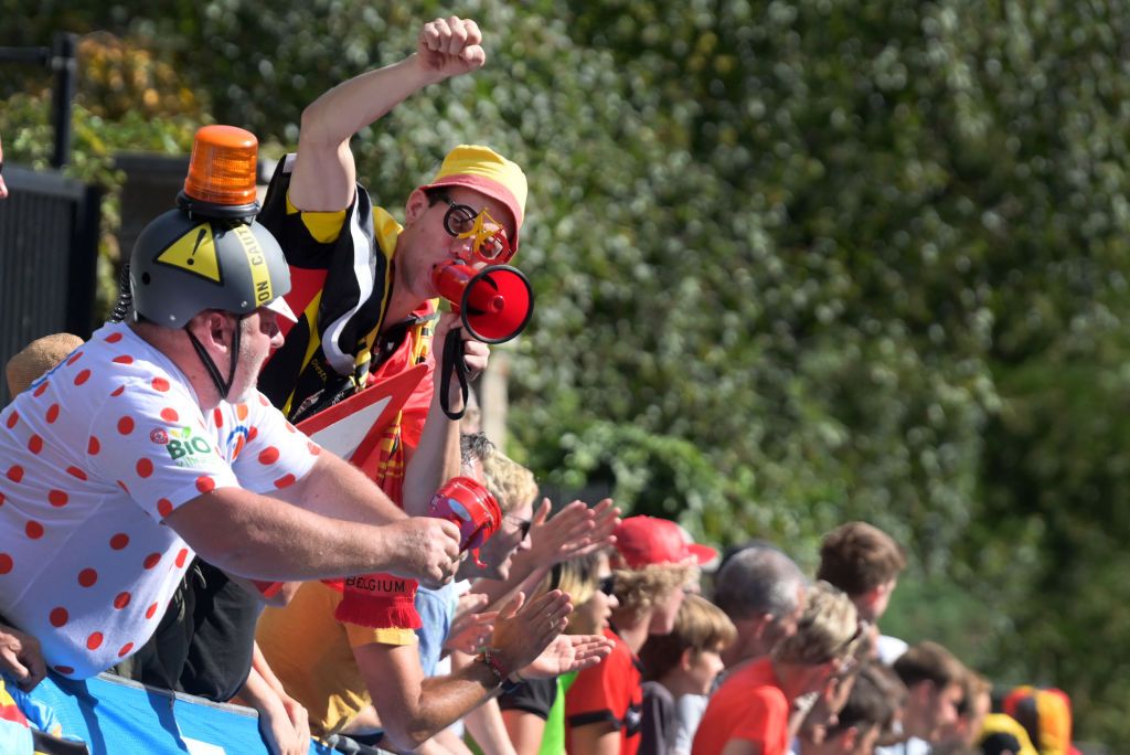 A cycling fan cheers during the womens elite cycling road race 1577km from Antwerp to Leuven on the seventh day of the Flanders 2021 UCI Road World Championships on September 25 2021 Photo by DAVID STOCKMAN BELGA AFP Photo by DAVID STOCKMANBELGAAFP via Getty Images