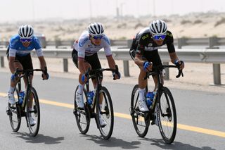 ABU DHABI UNITED ARAB EMIRATES FEBRUARY 21 LR Pavel Kochetkov of Russia Michael Kukrle of Czech Republic and Dmitrii Strakhov of Russia and Team Gazprom Rusvelo most aggressive jersey compete in the breakaway during the 4th UAE Tour 2022 Stage 2 a 176km stage from Hudayriyat Island to Abu Dhabi Breakwater UAETour WorldTour on February 21 2022 in Abu Dhabi United Arab Emirates Photo by Tim de WaeleGetty Images