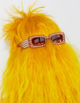 bright lemon yellow hair with brown pearl sunglasses by Bleach London