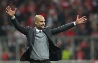 Pep Guardiola celebrates during a 5-1 win for Bayern Munich over Arsenal in November 2015.