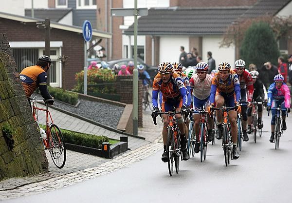 The peloton passes the Merckx lookalike - now that's living art!