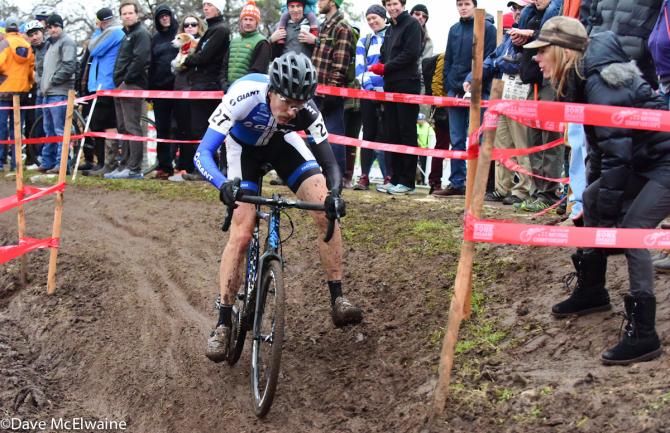 Mountain biker Carl Decker (Team Giant) riding an off-camber section of course
