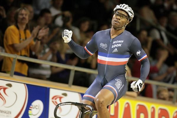 Gregory Bauge (France) celebrates after he beat Chris Hoy (Great Britain) to go into the semi final of the men's sprint.