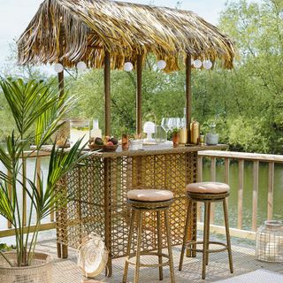 decking decoration tiki bar and two stools