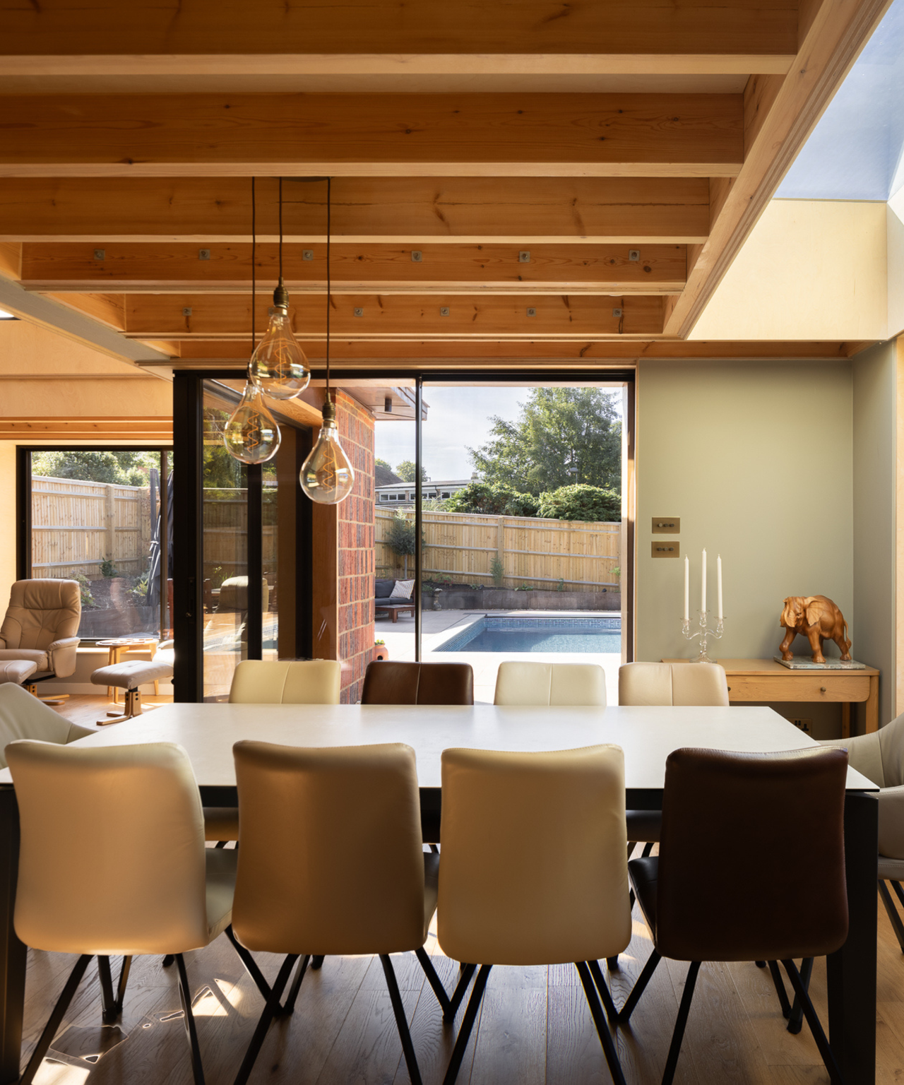 dining room with views outside to the pool