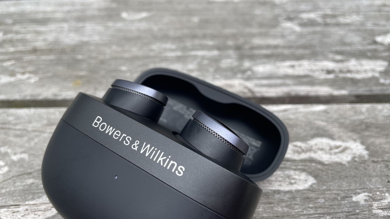 Bowers &amp; Wilkins Pi8 against grey wood background