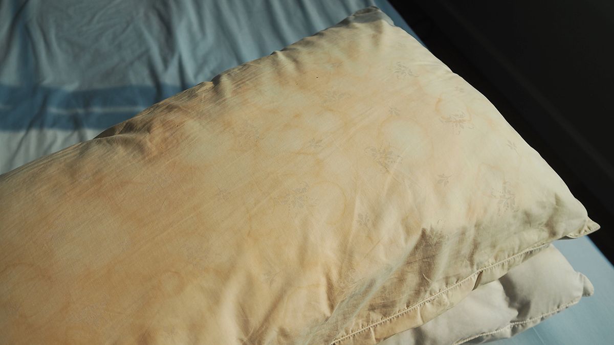 This is what happens to your pillows when they aren’t washed regularly