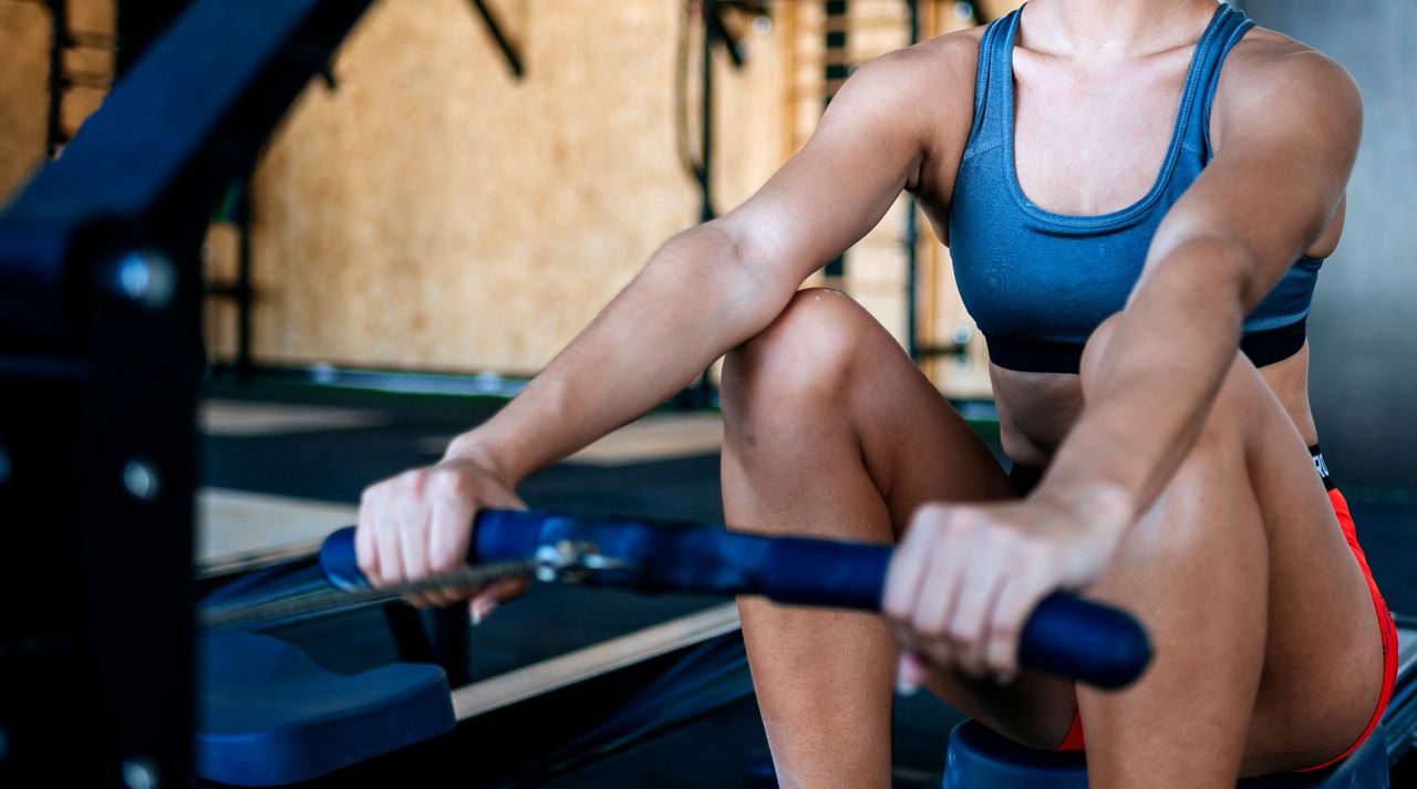 woman on rowing machine