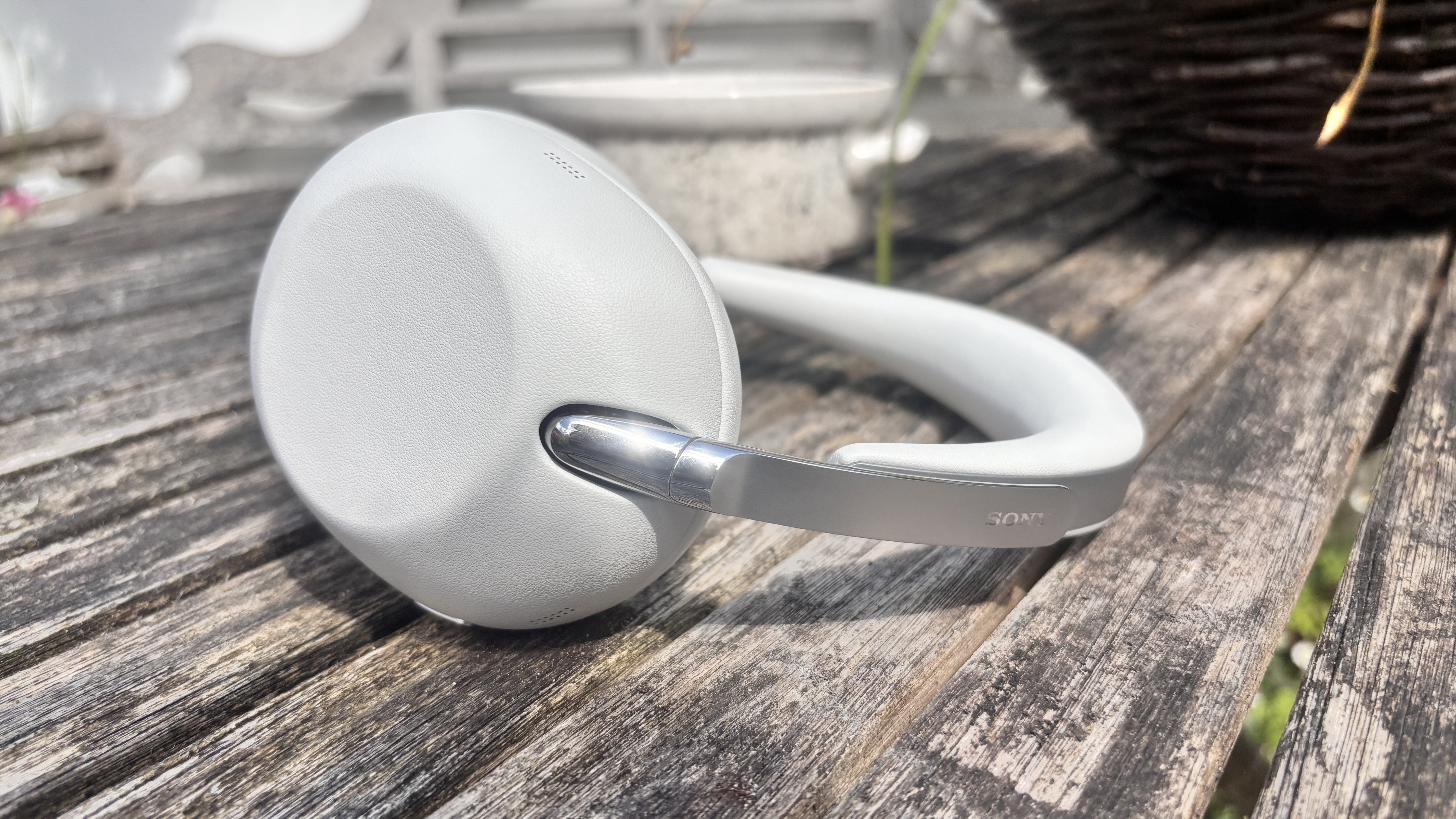 Sony 1000X The Collexion over-ear wireless headphones in white on a table