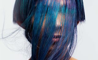 Model with dyed blue hair, Colour Alchemy colour-changing hair dye