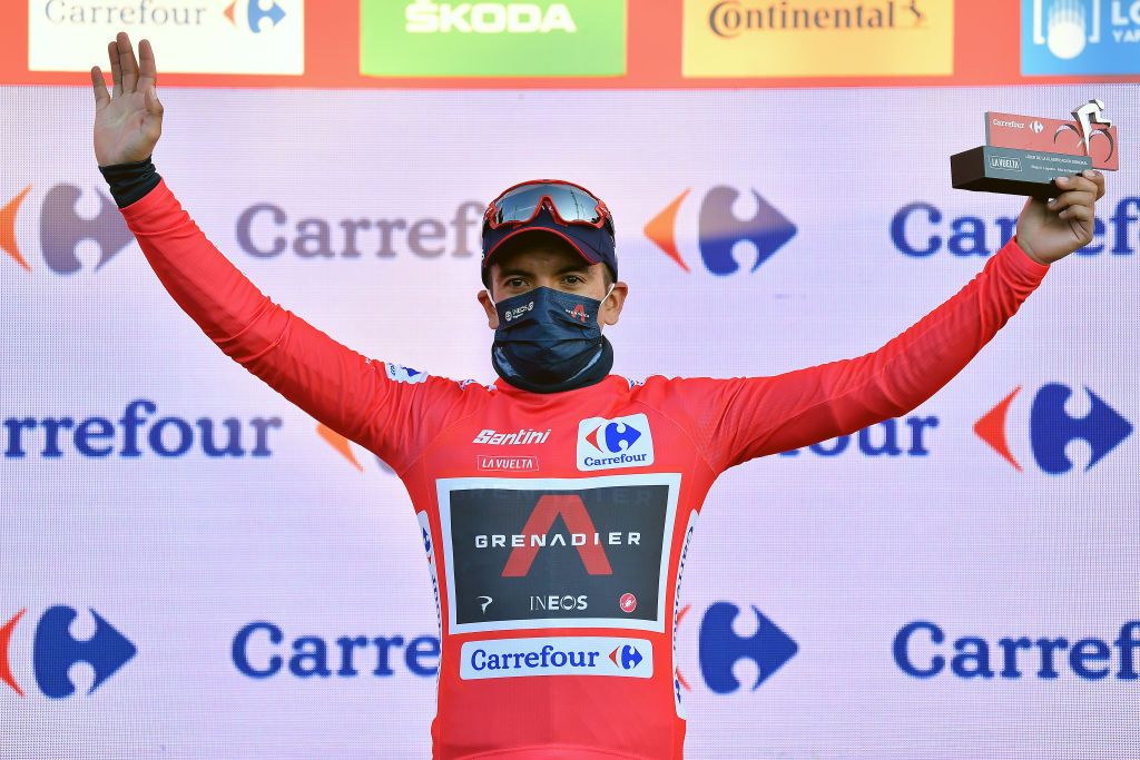 ALTODEMONCALVILLO SPAIN OCTOBER 28 Podium Richard Carapaz of Ecuador and Team INEOS Grenadiers Red Leader Jersey Celebration Trophy during the 75th Tour of Spain 2020 Stage 8 a 164km stage from Logroo to Alto de Moncalvillo 1490m lavuelta LaVuelta20 on October 28 2020 in Alto de Moncalvillo Spain Photo by Justin SetterfieldGetty Images