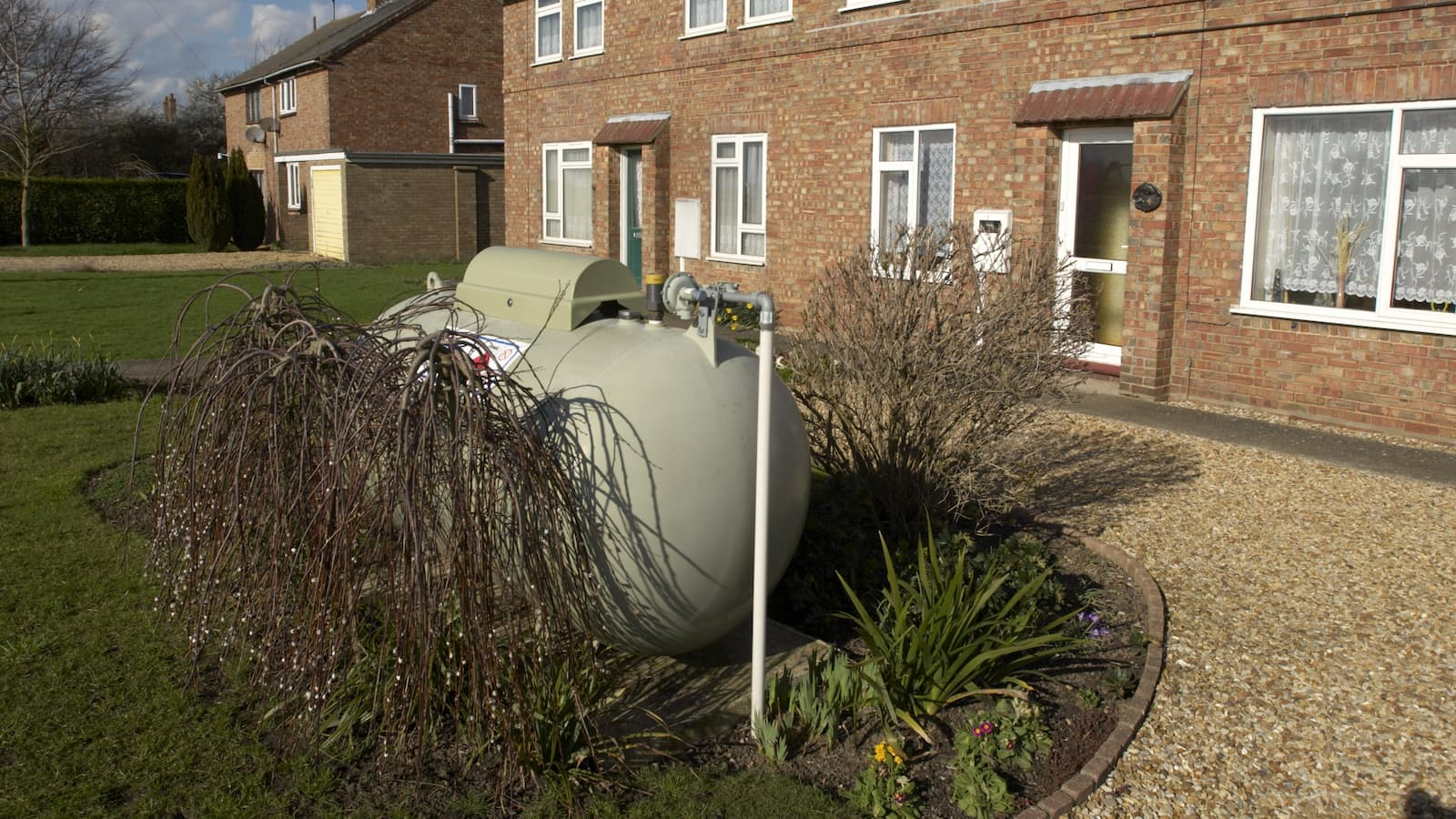 Semi-detached home with solar panels and oil heating