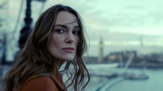 Keira Knightley in the Netflix TV show Black Doves. She looks concerned