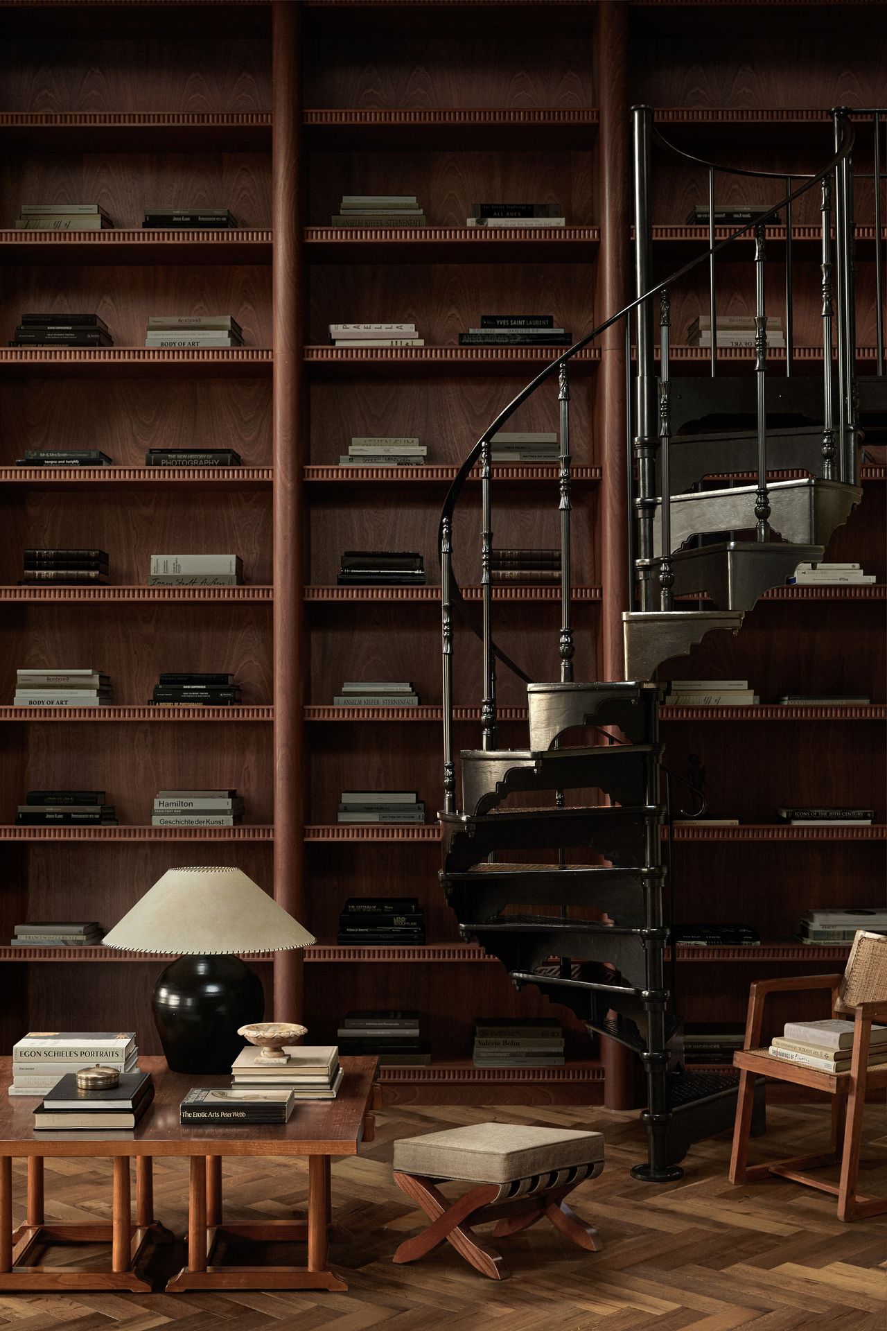 dark interior design with bookshelf detailing