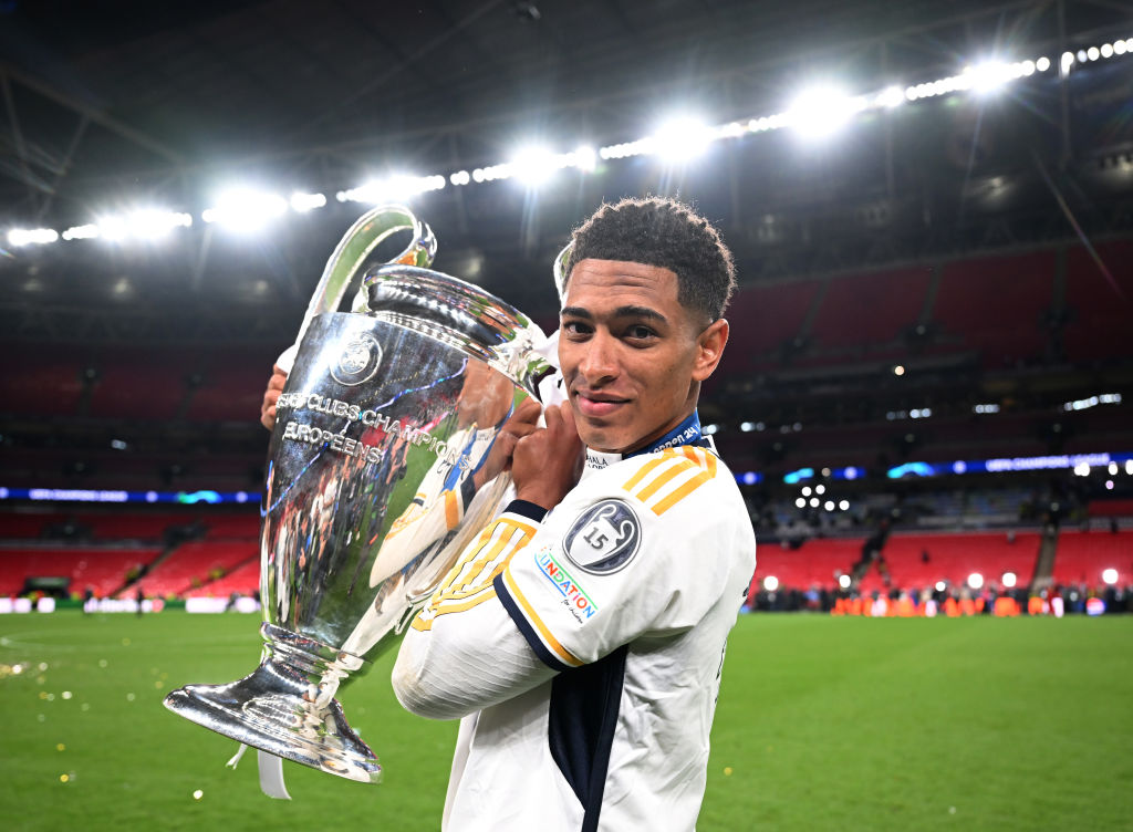 Jude Bellingham of Real Madrid poses for a photo with the UEFA Champions League Trophy following the team's victory during the UEFA Champions League 2023/24 Final match between Borussia Dortmund and Real Madrid CF at Wembley Stadium on June 01, 2024 in London, England.