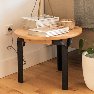 wooden side table with black industrial legs 