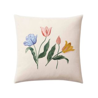 Throw pillow in white with embroidered tulips