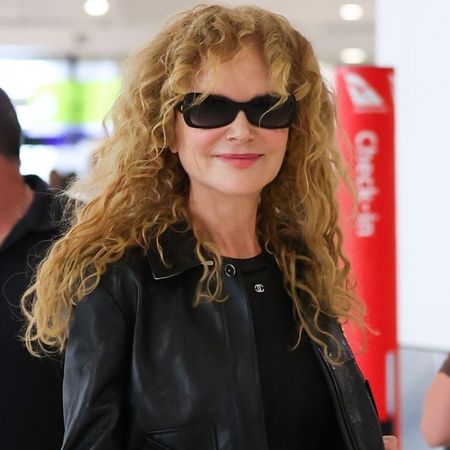 Nicole Kidman spotted catching a flight out of Sydney Airport with her daughters Faith Margaret and Sunday Rose wearing a black jacket, Chanel khaki pants, and a black Chanel 25 bag. 