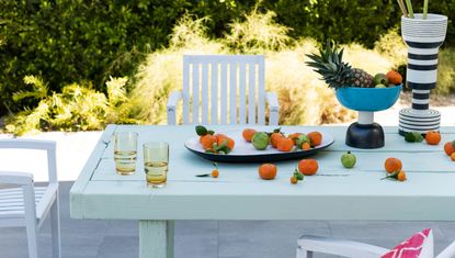 Outdoor dining table painted blue