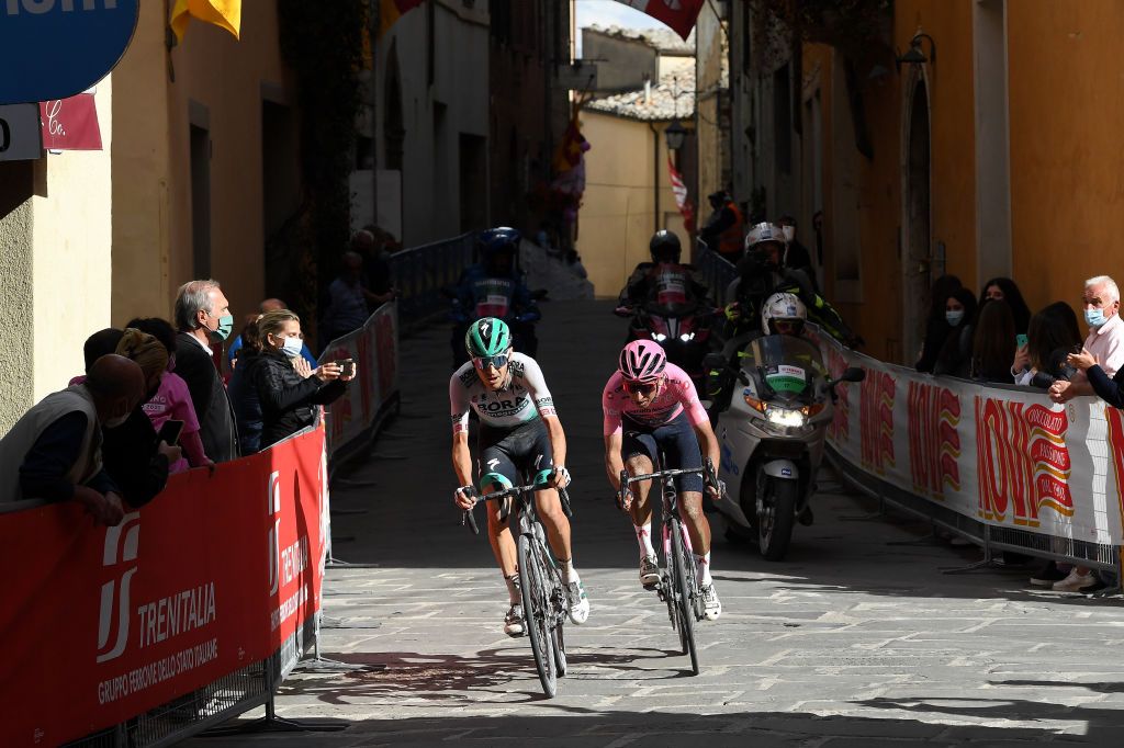 MONTALCINO ITALY MAY 19 Emanuel Buchmann of Germany and Team Bora Hansgrohe Egan Arley Bernal Gomez of Colombia and Team INEOS Grenadiers Pink Leader Jersey during the 104th Giro dItalia 2021 Stage 12 a 162km stage from Perugia to Montalcino 554m girodiitalia UCIworldtour Giro on May 19 2021 in Montalcino Italy Photo by Tim de WaeleGetty Images