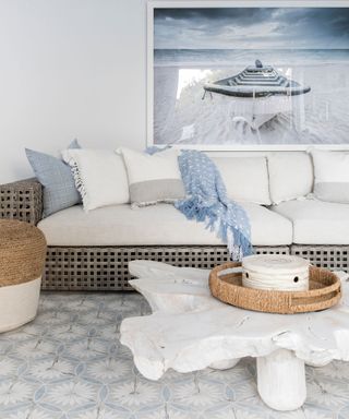 Coastal living room with pastel blue furnishings