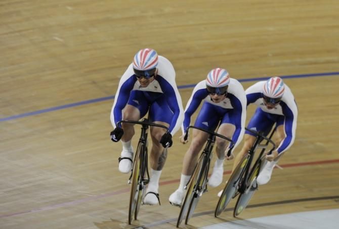 Great Britain's Jamie Staff, Jason Kenny and Chris Hoy compete in the 2008 Beijing Olympic Games men's track cycling team sprint qualifying