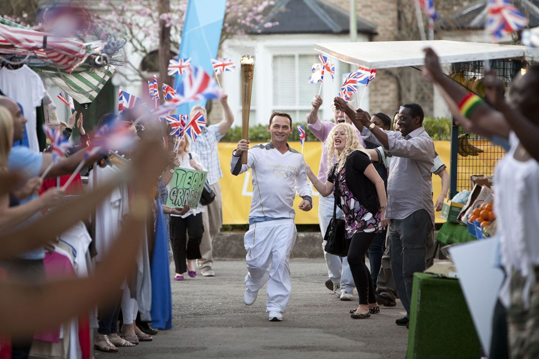 EastEnders&#039; Billy takes Olympic Torch to Walford