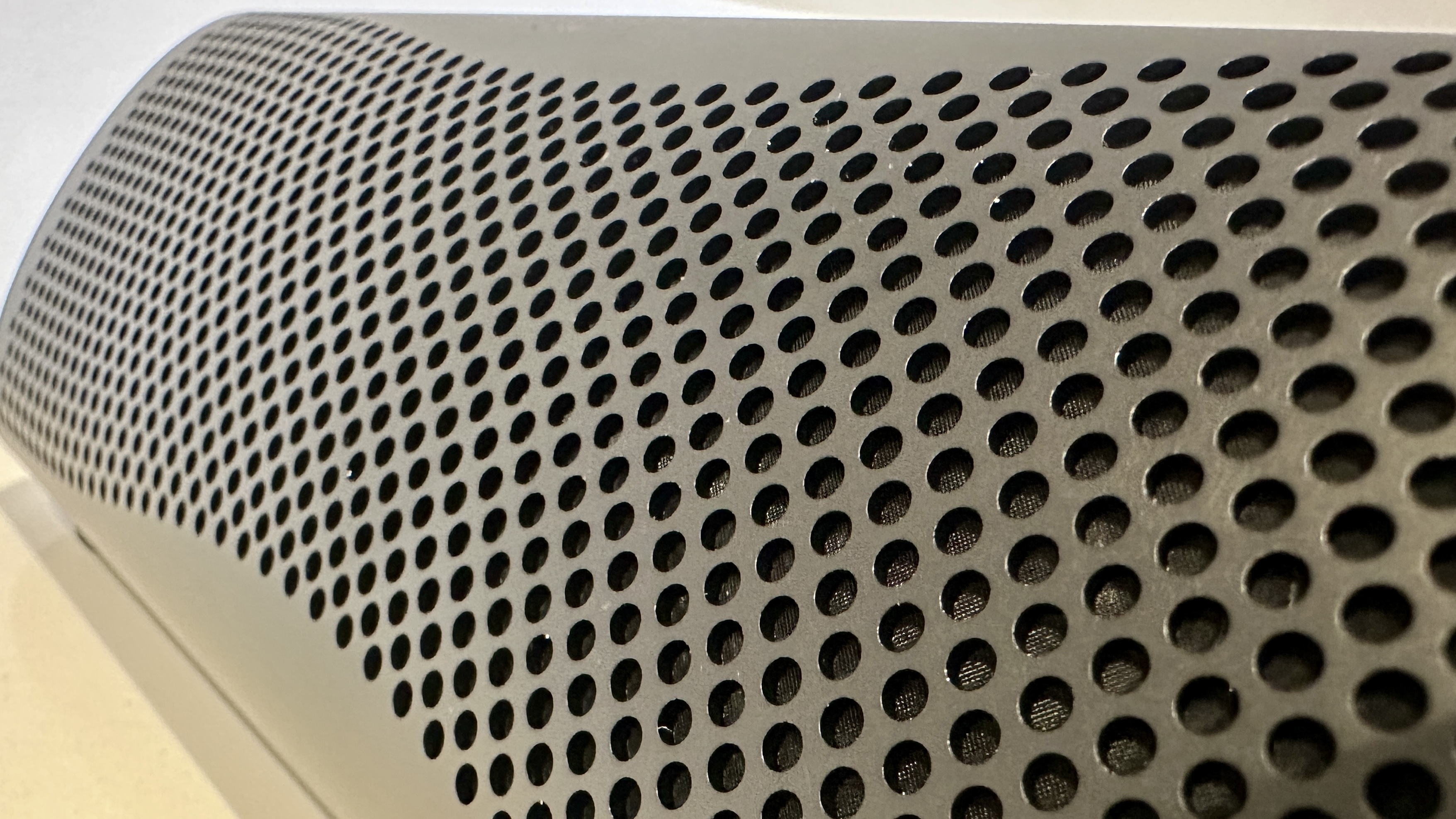 KEF Muo 2025 in black, on a white table