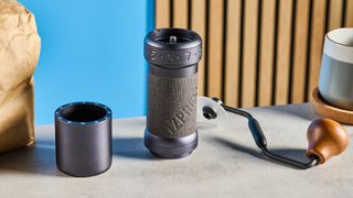 the 1zpresso k-ultra hand coffee grinder, a 7 inch tall coffee grinder with magnetic catch chamber and 48mm stainless steel burrs