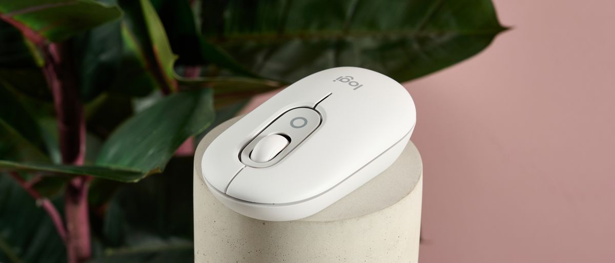 Logitech POP on plinth with pink and plant in background