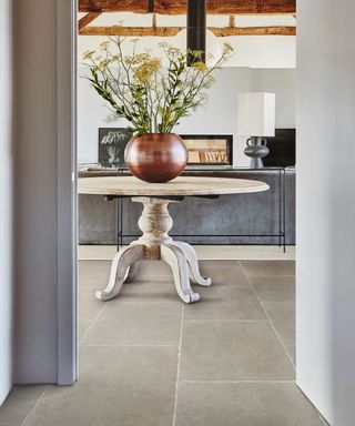 grey hallway with table