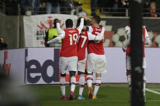 Arsenal's players celebrate with Saka
