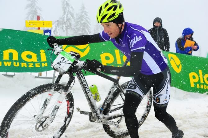 Kristian Hynek runs toward a second stage win