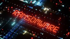 Circuit board with word ransomware lit up in neon red