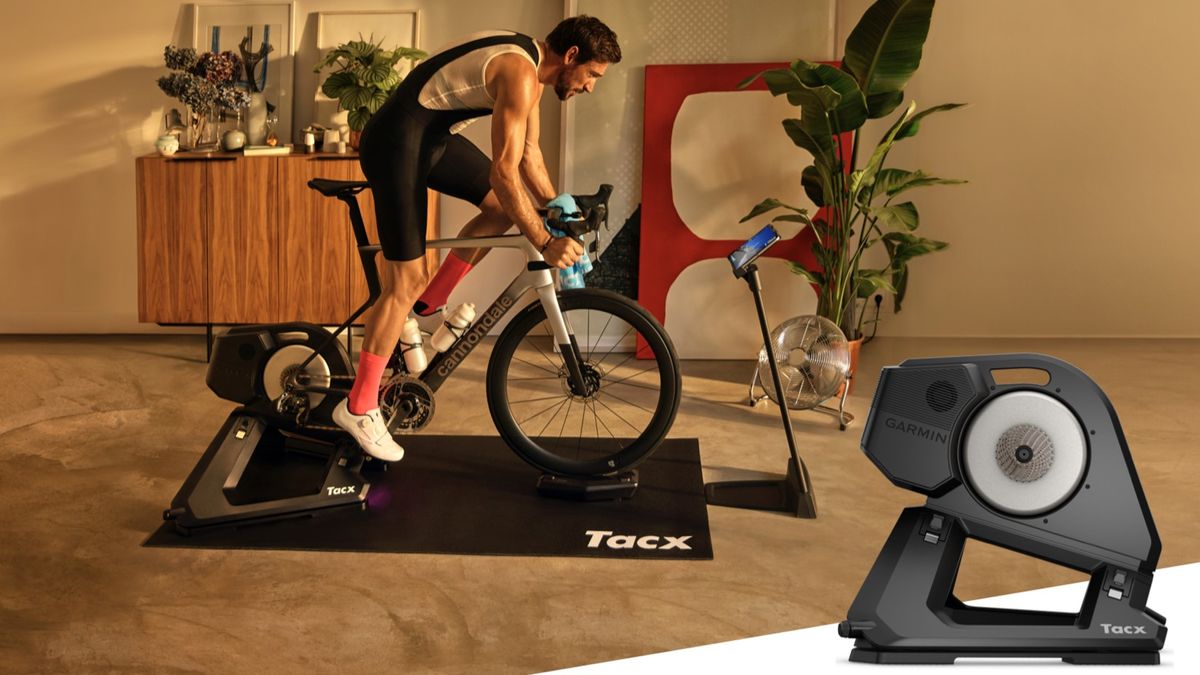 Man using Tacx NEO 3M bike trainer