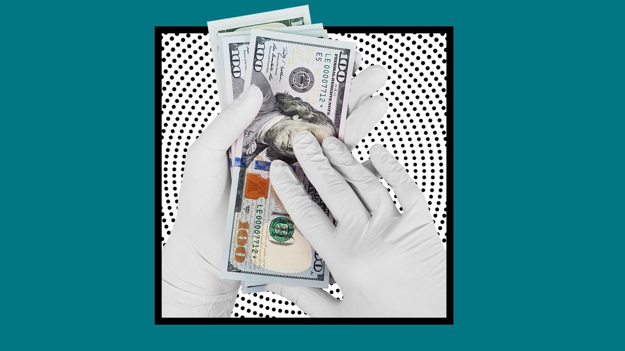 Gloves holding money