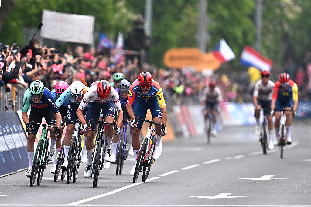 BURGAS, BULGARIA - MAY 08: (L-R) Tobias Lund Andresen of Denmark and Team Decathlon CMA CGM, Ethan Vernon of Great Britain and Team NSN Cycling, Paul Magnier of France and Team Soudal Quick-Step and Jonathan Milan of Italy and Team Lidl - Trek sprint at finish line during the 109th Giro d&amp;apos;Italia 2026, Stage 1 a 147km stage from Nessebar to Burgas / #UCIWT / on May 08, 2026 in Burgas, Bulgaria. (Photo by Tim de Waele/Getty Images)