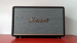 Marshall Acton III review: speaker head on sat on red shelf