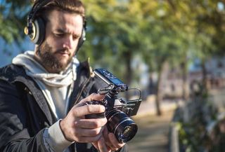 With no integral headphone jack, the current OM-D E-M5 Mark II requires the optional HLD-8G grip or a separate audio recorder like the LS-P4 to use headphones