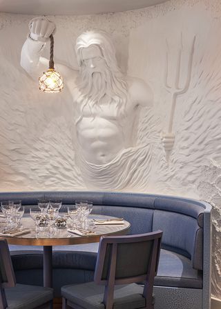 Manzi's restaurant neptune sculpture