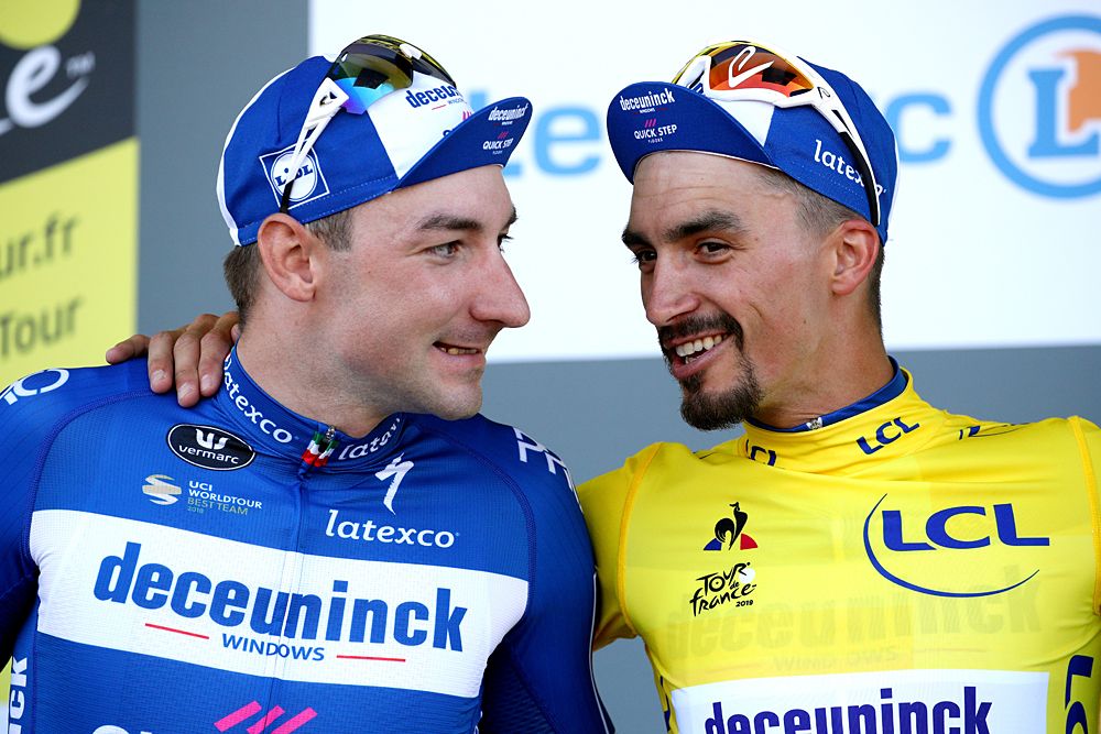 Elia Viviani, stage 4 winner, and Julian Alaphilippe, overall leader, celebrate success at the Tour de France