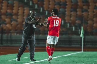 Pitso Mosimane celebrating with Marwan Mohsen