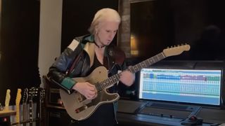 John 5 plays one of his hot-rodded Fender Telecasters in his studio