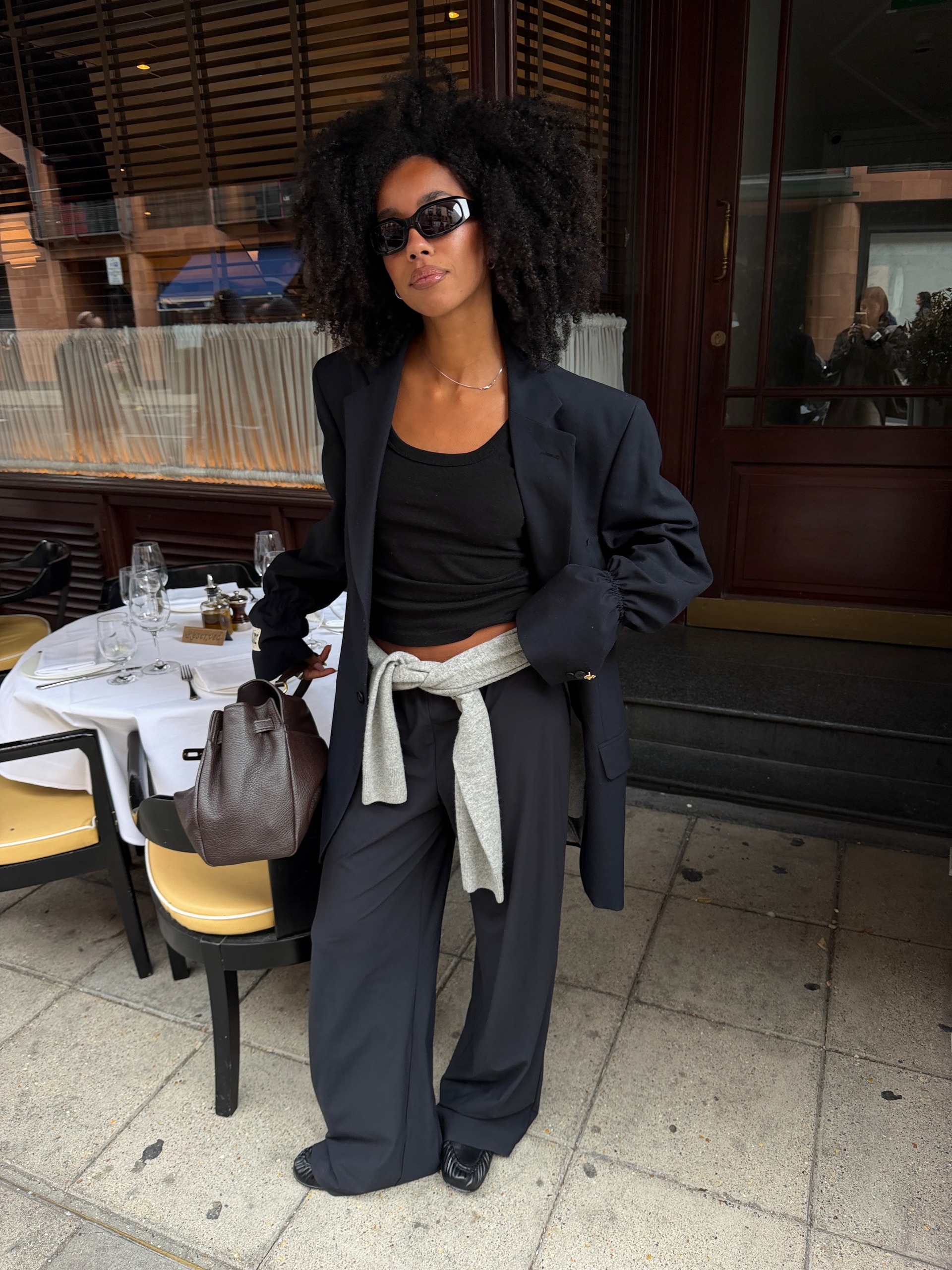 An image of a woman wearing put together fall outfit formula 2026