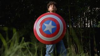 Marvel collaboration with Magic: The Gathering trailer still - a kid with a Captain America shield