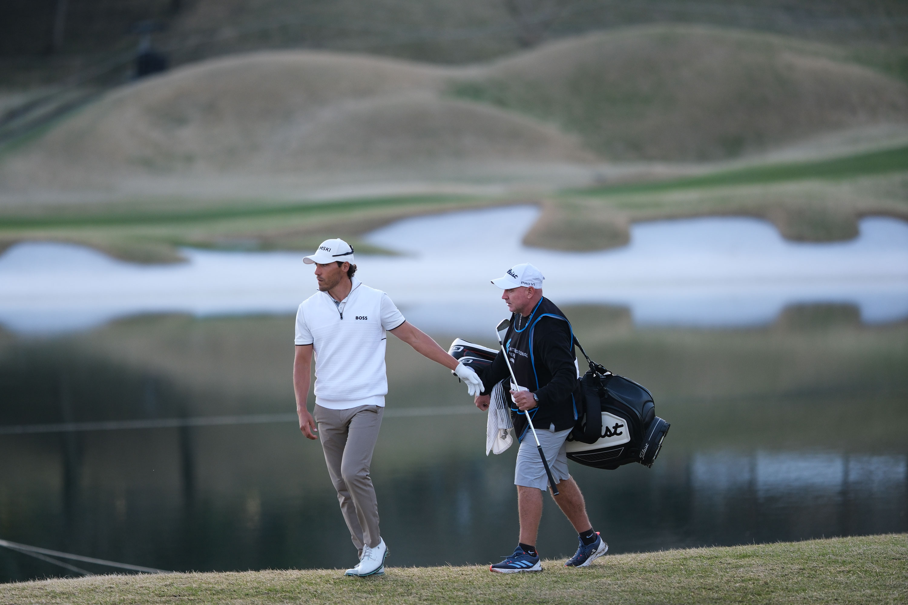Dominic Foos and his caddie Ken Lowry