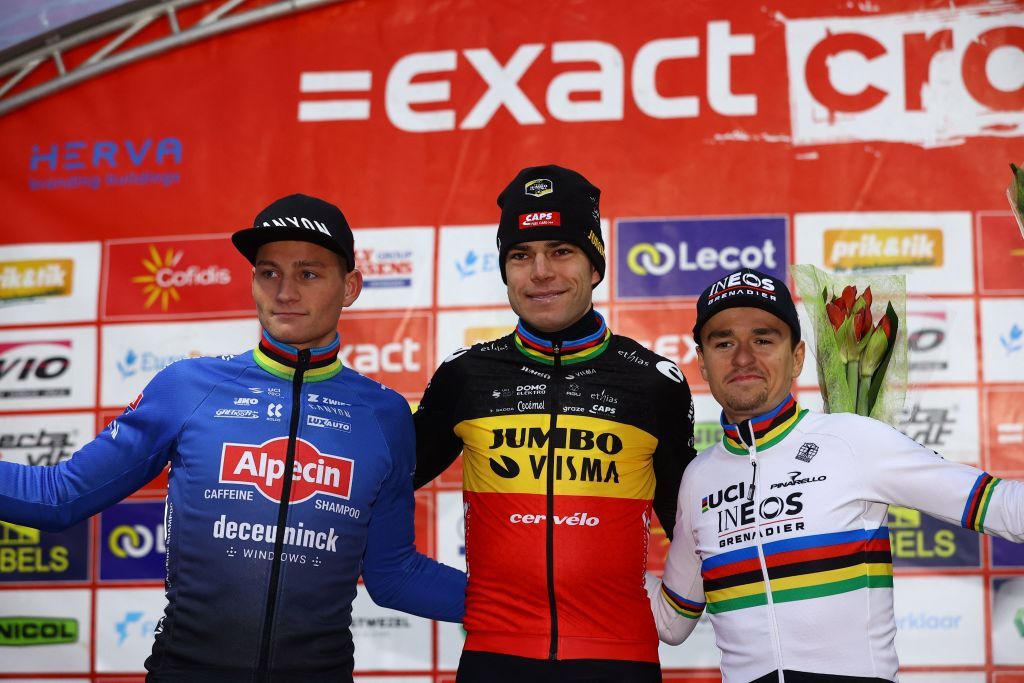 LtoR Second placed Dutch Mathieu Van Der Poel winner Belgian Wout Van Aert and third placed British Thomas Tom Pidcock celebrate on the podium after the mens elite race of the cyclocross cycling event race 68 during the Exact Cross competition on December 30 2022 in Loenhout Belgium LtoR Second placed Dutch Mathieu Van Der Poel winner Belgian Wout Van Aert and third placed British Thomas Tom Pidcock Belgium OUT Photo by DAVID PINTENS BELGA AFP Belgium OUT Photo by DAVID PINTENSBELGAAFP via Getty Images