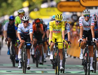 TORINO, ITALY - JULY 01: (L-R) Remco Evenepoel of Belgium and Team Soudal Quick-Step - White Best Young Rider Jersey, Tadej Pogacar of Slovenia - Yellow Leader Jersey and Nils Politt of Germany and UAE Team Emirates cross the finish line during the 111th Tour de France 2024, Stage 3 a 230.8km stage from Piacenza to Torino / #UCIWT / on July 01, 2024 in Torino, Italy. (Photo by Dario Belingheri/Getty Images)