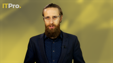 Presenter Ant Joblin on a yellow background talking to the camera